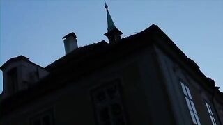 A red-haired woman caresses her body and spreads her legs to masturbate