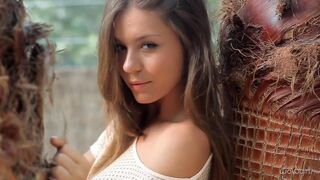 A beautiful Russian girl named Ruslan was taking off her clothes and teasing with her body