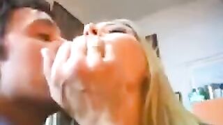 A hot blondie is getting fucked by two rich guys on the couch