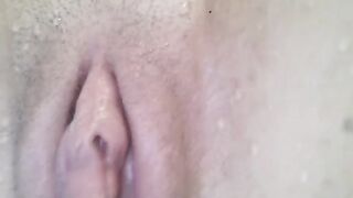 A great orgasm of a girl while playing in the water