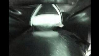 A hotwife fucks in a latex suit while her husband watches