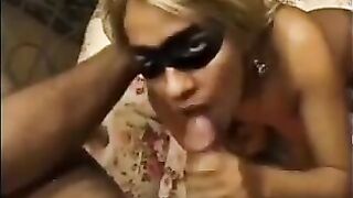 A woman is having sex with another man in front of her husband