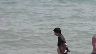 Nude beauty washing in the sea, a thrilling and erotic sight to behold!