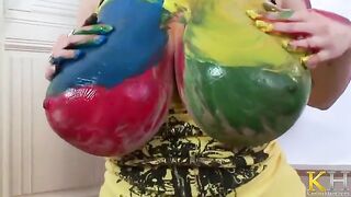 The artist is fucking with herself with her brush during creation