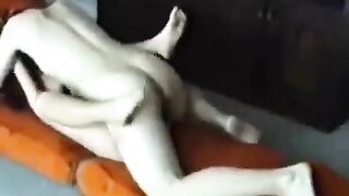 A married couple has sex at home, showcasing their passionate homemade moments