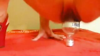 Fisting with a bottle and a large dildo, just like in the best eporn videos