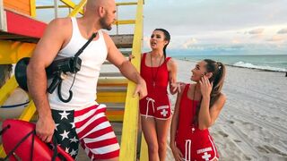 Two hot girls are having fun with a lifeguard in an FFM threesome