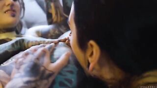 Girl fucked in her ass using a strap-on dildo in a passionate lesbian scene