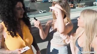 A couple of lesbians are having fun on the strip with another girl