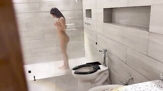 A young beautiful Venezuelan has a passionate shower session