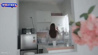 A cute petite teen offers tea and possibly more to a stranger