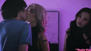 An Asian girl and a blonde in a hot threesome
