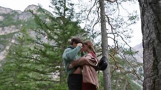 A couple engaged in passionate sex right in the forest, under the open sky