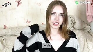 An almost naked girl is trying to please her boyfriend, but she's dragging her feet