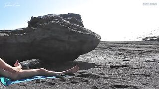 Nude beauty rubs her pussy on the beach and makes a guy cum