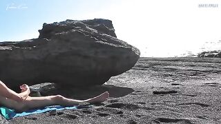 Nude beauty rubs her pussy on the beach and makes a guy cum