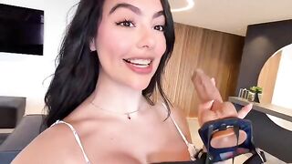 With the strap-on in her hands—they’re both in heaven