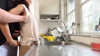 A mature woman with big breasts was fucked in the kitchen