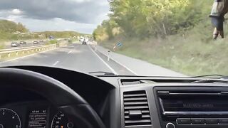 The girl is having fun with the guy in his car, exploring new thrills