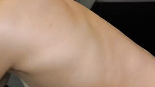 A girl chokes and the guy films her huge boobs in the kitchen