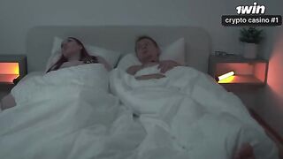 A couple has a passionate encounter in their shared space, unable to stop