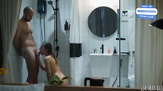 A couple has hot sex in the shower stall, which is just big enough for them
