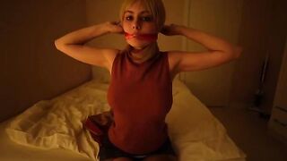A cute girl in a cosplay costume plays out her favorite game