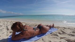 The girl has a huge ass, which is very attractive to guys, especially at the beach
