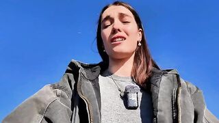 Hot brunette babe masturbating on a public beach